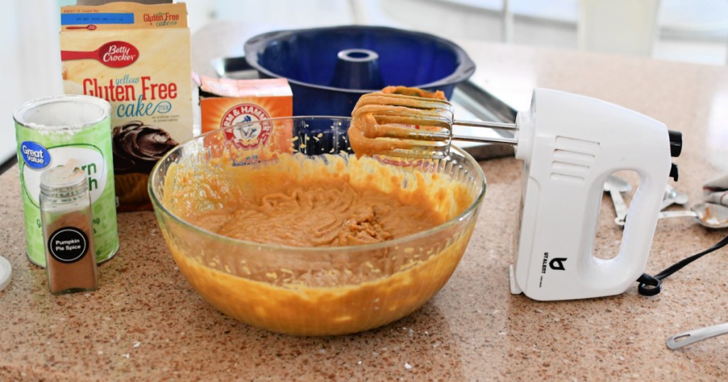 mixing gluten-free cake mix with pumpkin