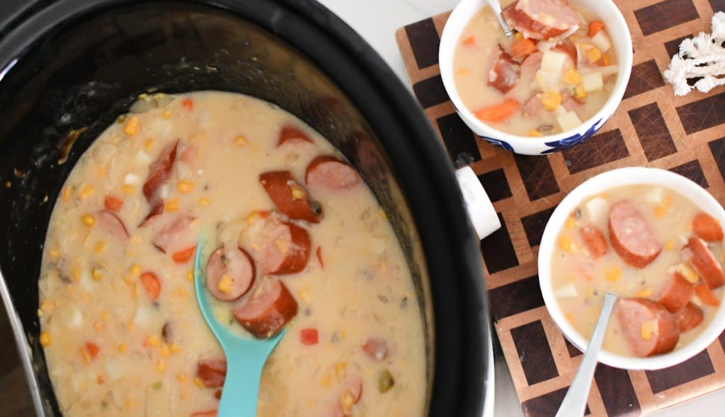 Two bowls of sausage corn soup after cooking. 