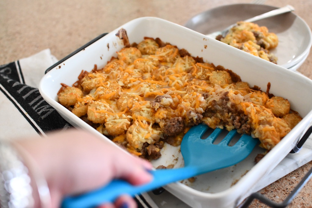 serving up tater tot casserole 