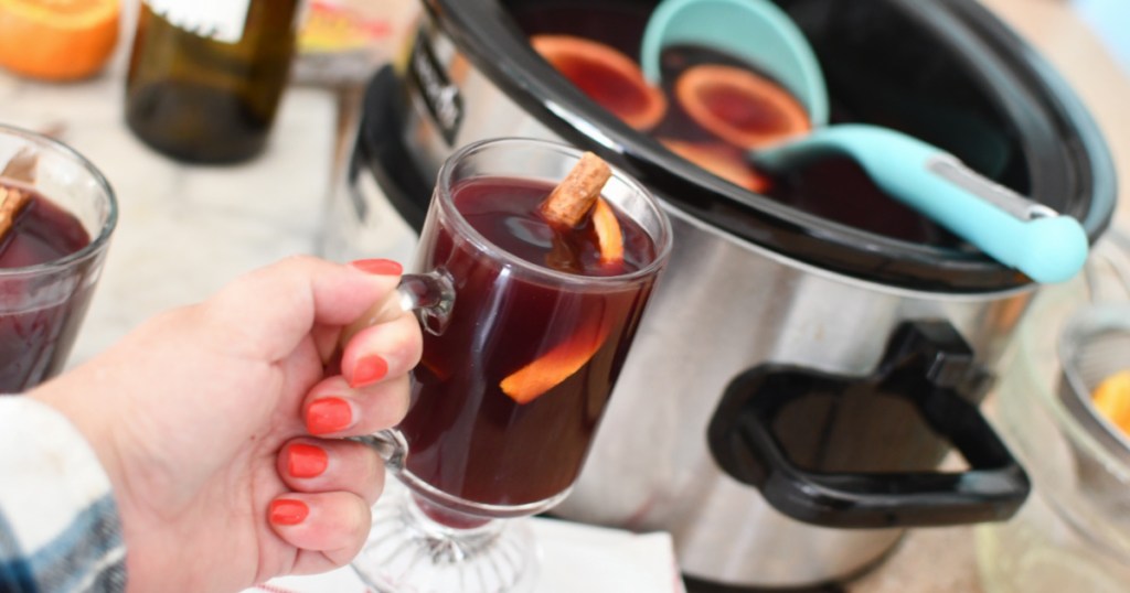 holding mulled wine