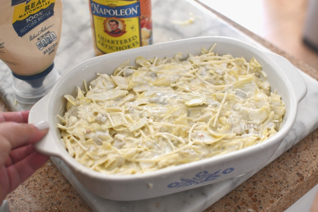 casserole dish with artichoke dip