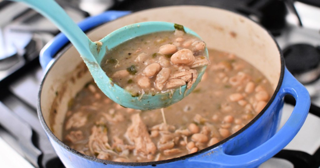 pot with white bean chili on stove