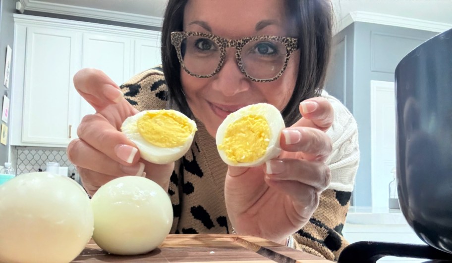 woman holding perfect hard-boiled eggs