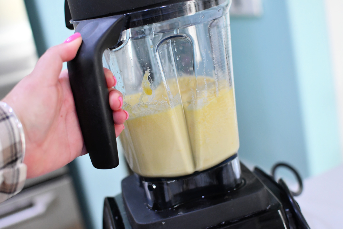 blending up lemon butter and sugar in a Vitamix blender