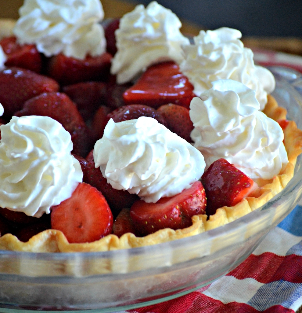 fresh strawberry pie with whipped cream