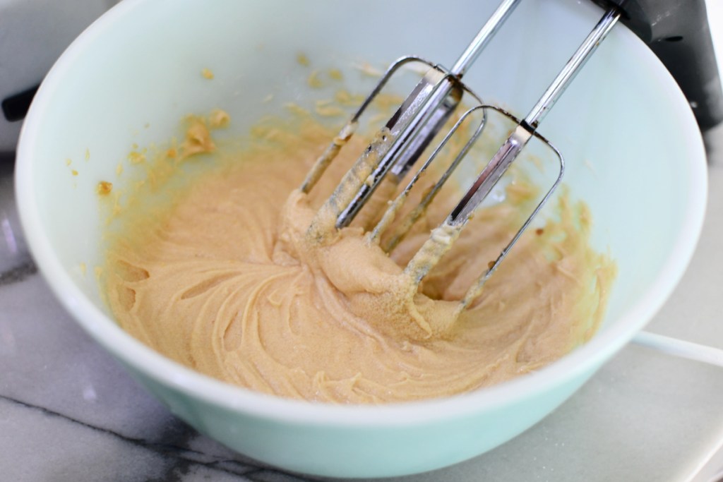 mixing wet ingredients in a mixing bowl