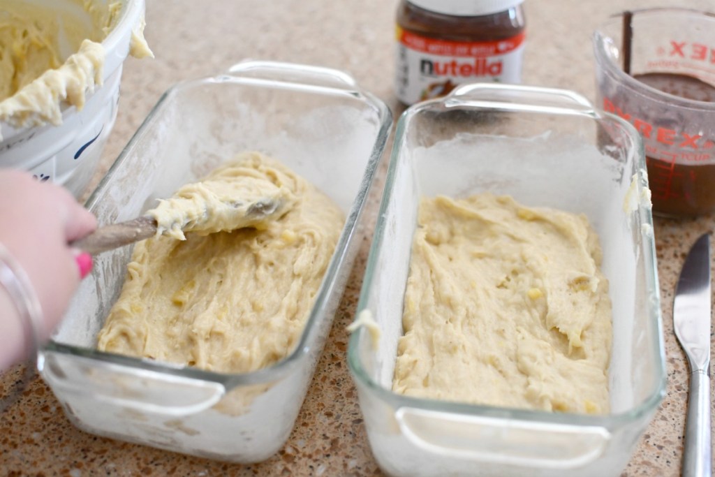 spreading banana bread batter in the pan