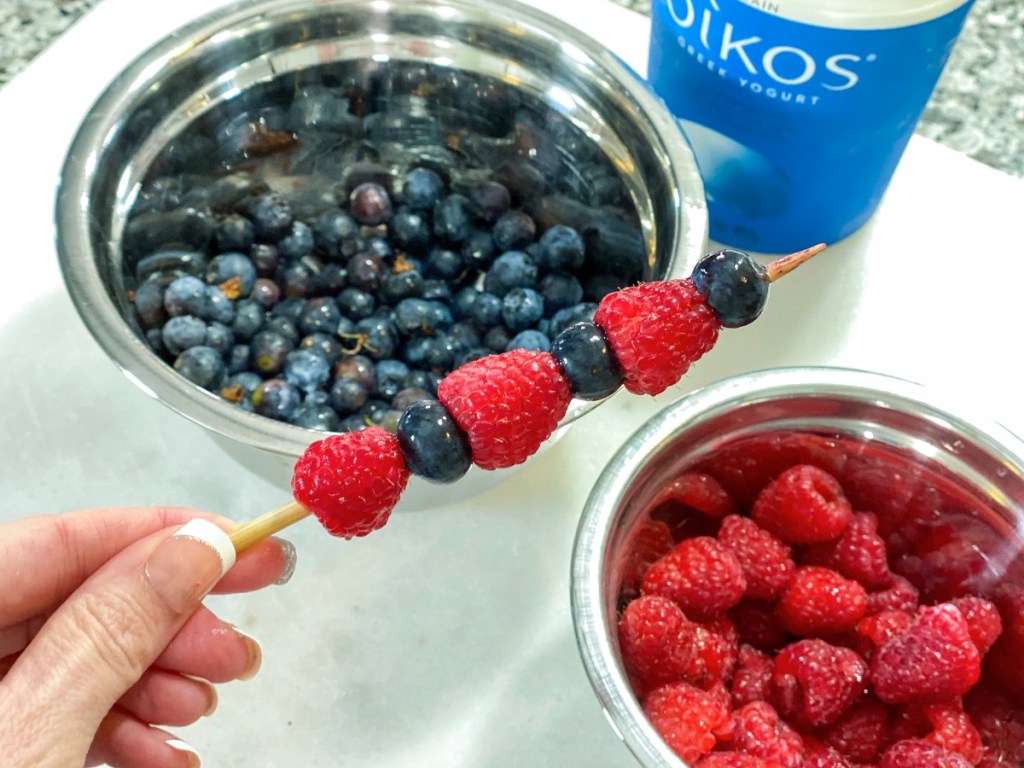 raspberries and blueberries on stick