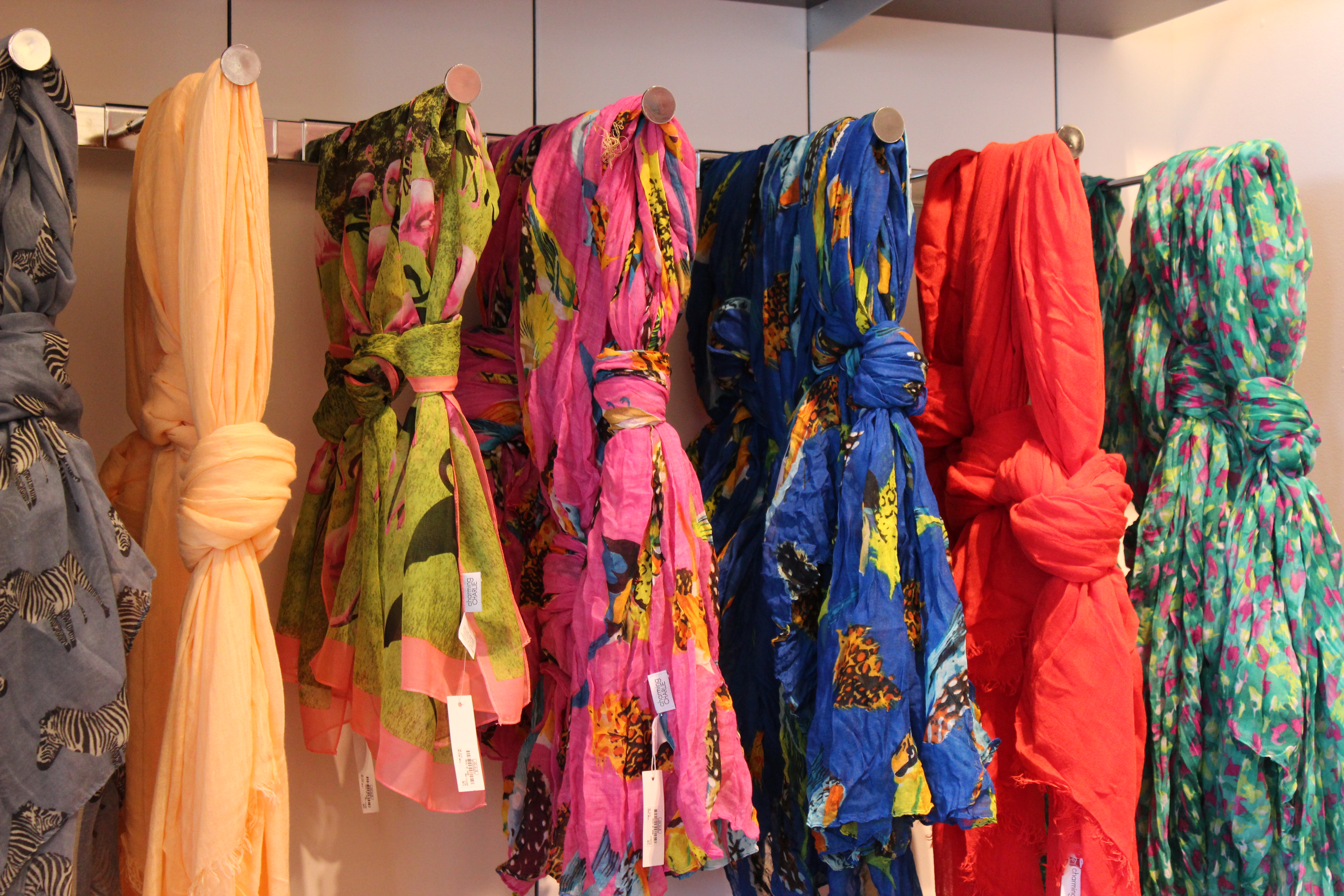 Get a FREE $5 Charming Charlie Voucher to Spend In-Store During Your Birthday Month - scarves display