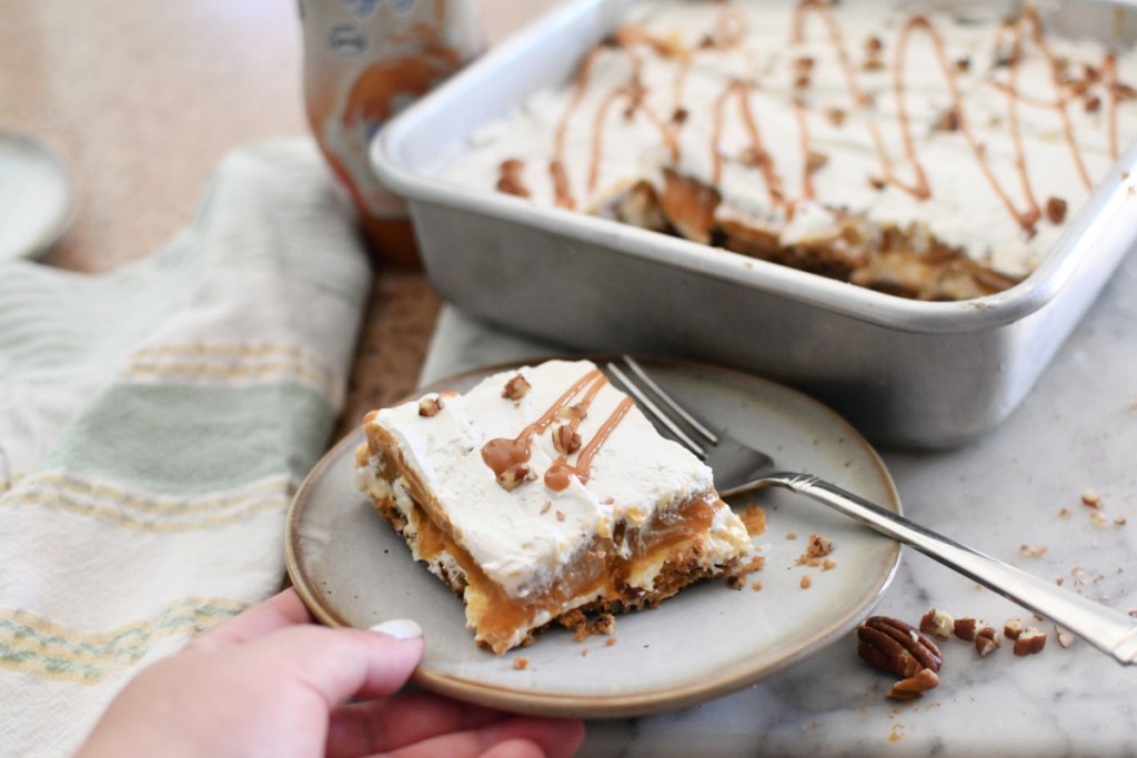 slice of 4-layer pumpkin delight on a plate