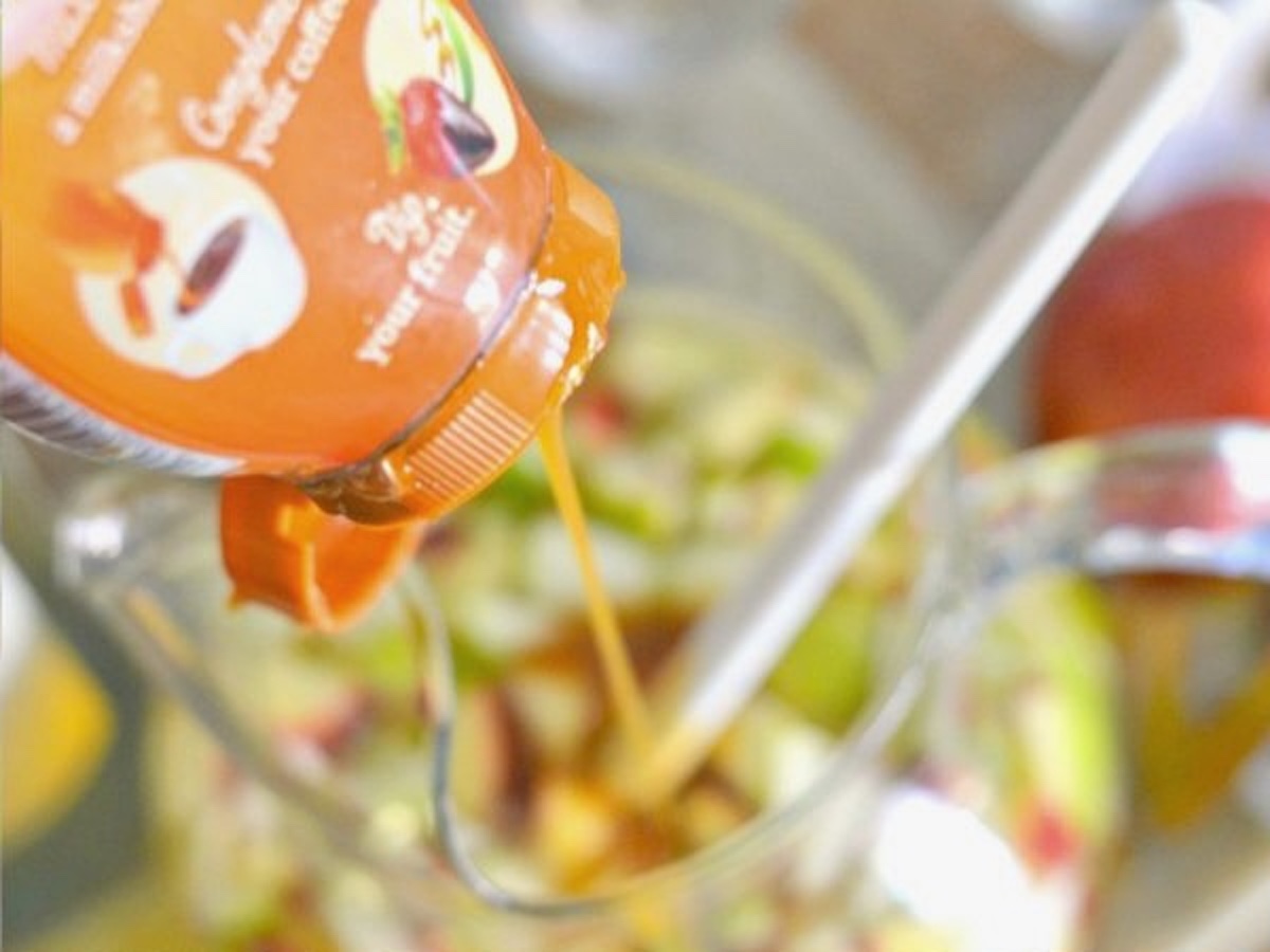 caramel syrup being poured in pitcher