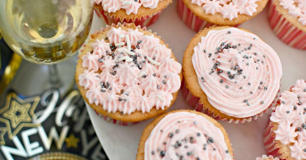 champagne cupcakes with sprinkles