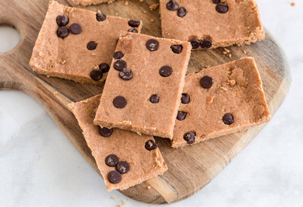 cookie bars on wooden cutting board