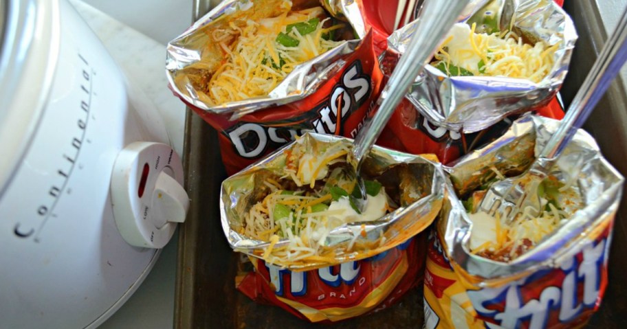 bags of fritos with taco toppings for walking tacos