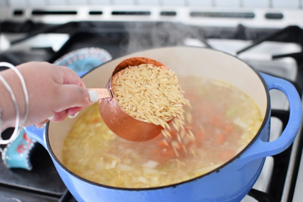 adding orzo to soup