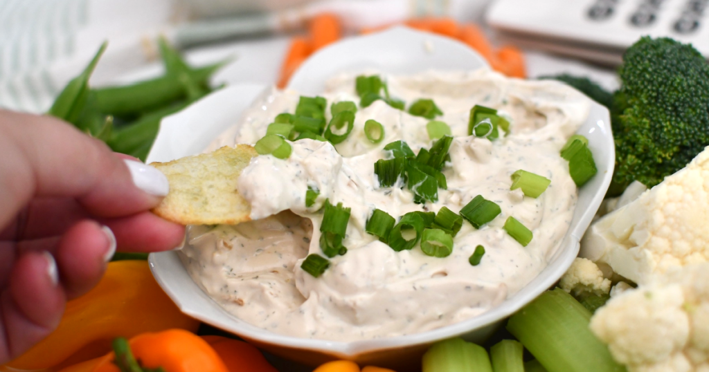 dipping chip in homemade french onion dip 