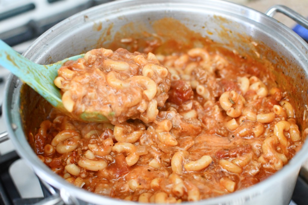 mixing cheese with goulash