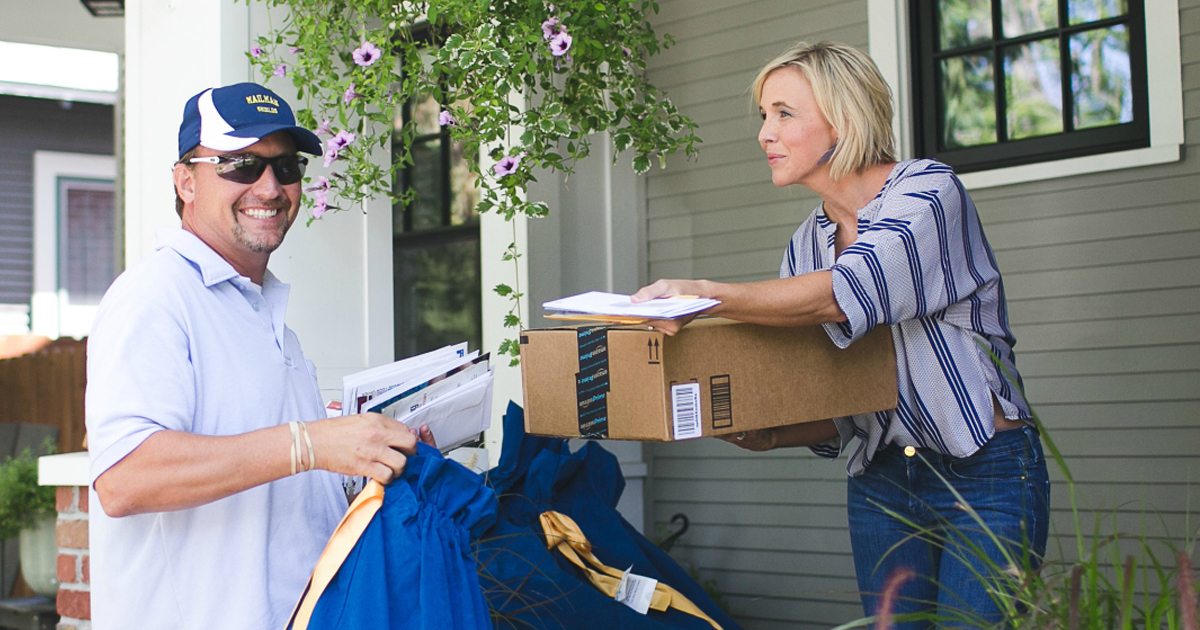 postal worker delivering mail to Collin