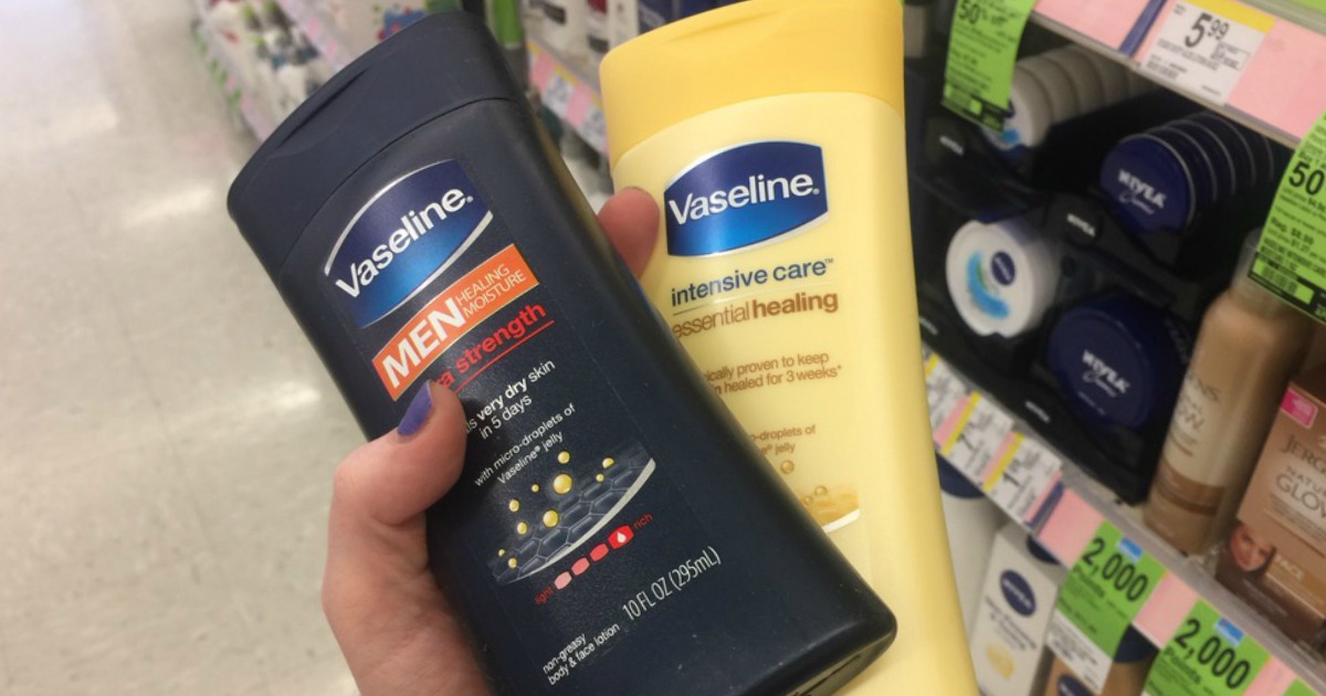 Hand holding Vaseline Lotions