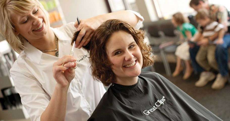 woman getting hair cut at Great Clips