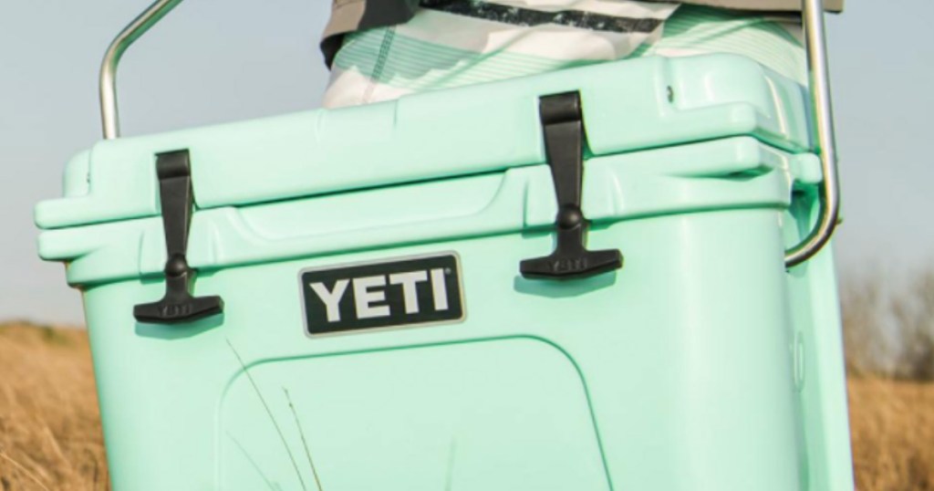 Yeti Roadie Cooler being held in a field