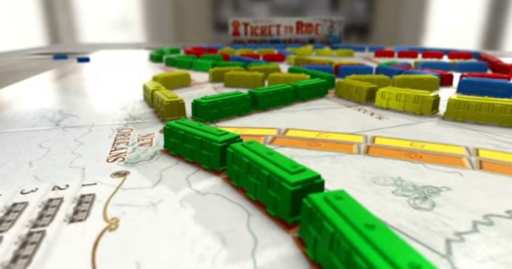 Ticket to Ride Board Game laid out on table with trains