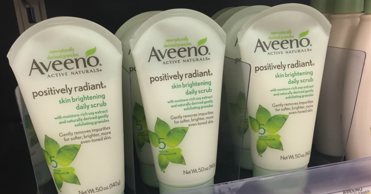 bottles of aveeno face scrub on a store shelf