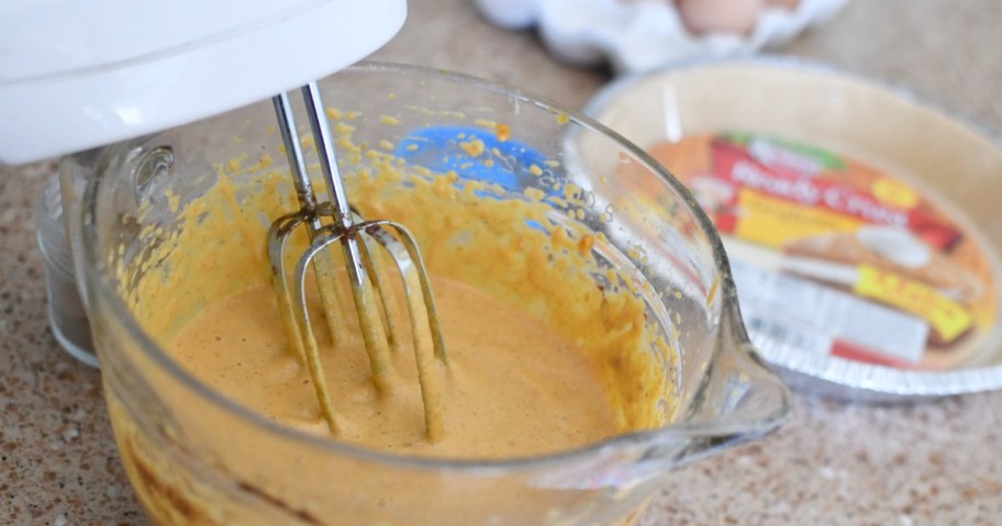 beating pumpkin pie filling together