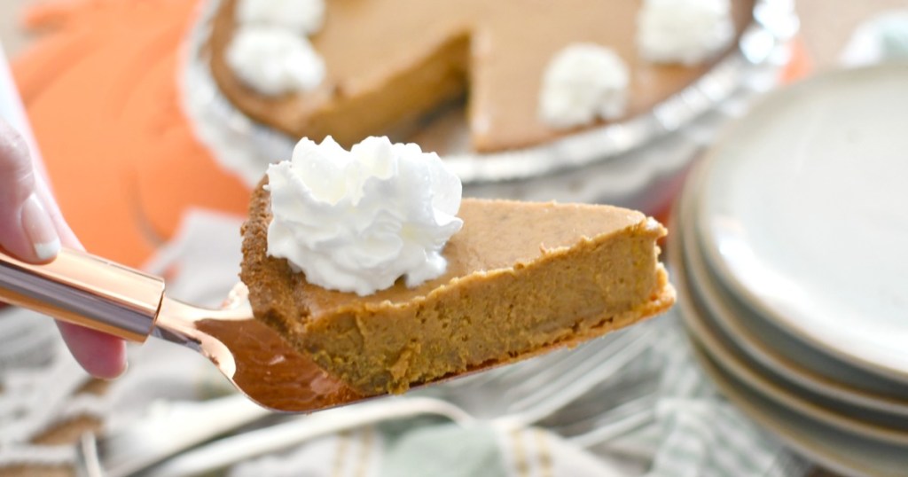 slice of pumpkin pie on a pie server