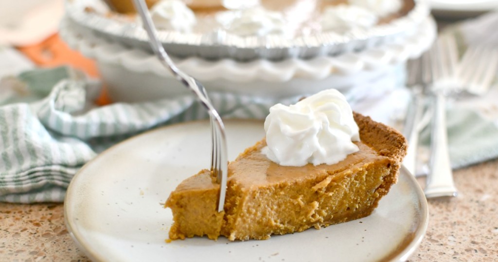 taking a bite of pumpkin pie