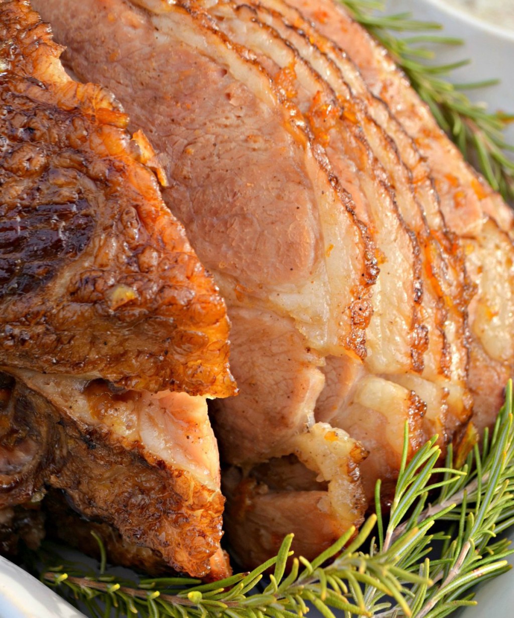 glazed ham sitting on a tray