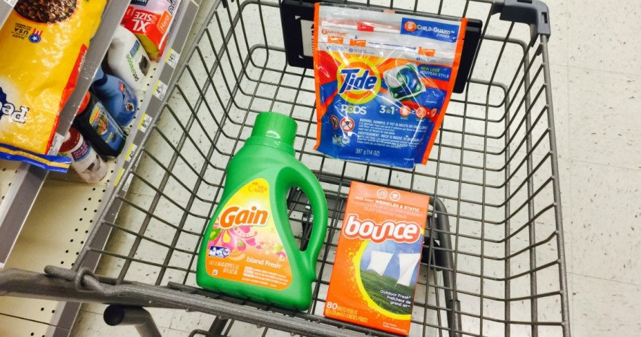 tide pods in bag, gain laundry detergent bottles, bounce dryer sheets in cart