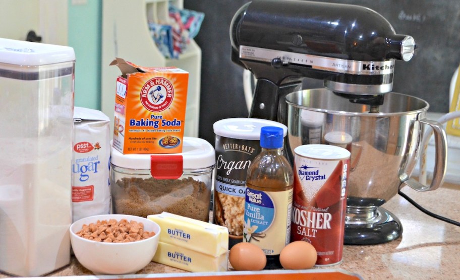 baking ingredients on kitchen counter with black kitchenaid mixer