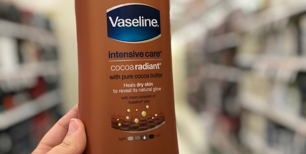 hand holding Vaseline cocoa radiant lotion