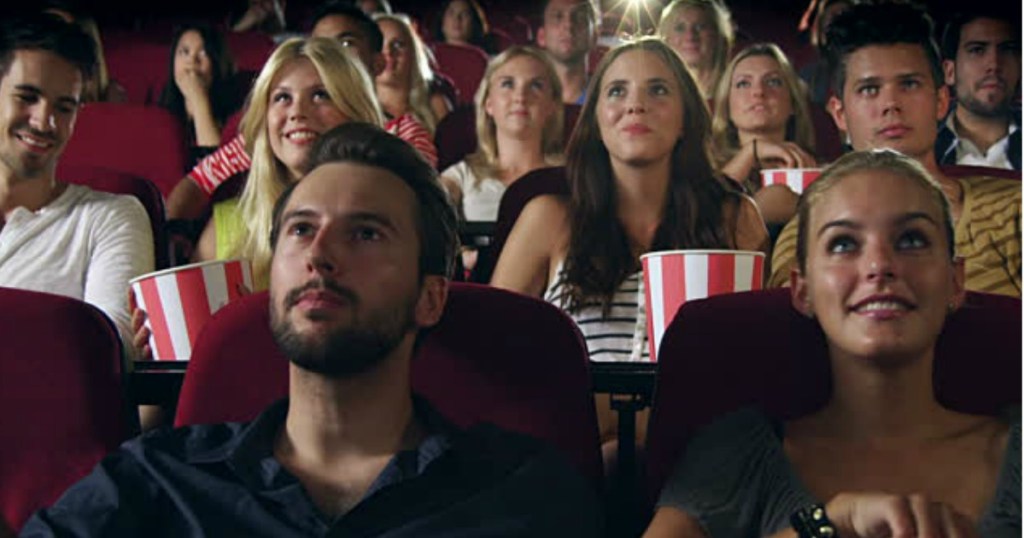 people Watching a movie in the theater