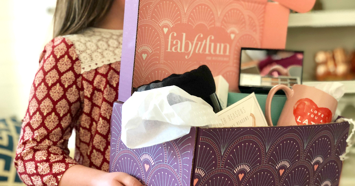 FabFitFun Box in the arms of a young girl