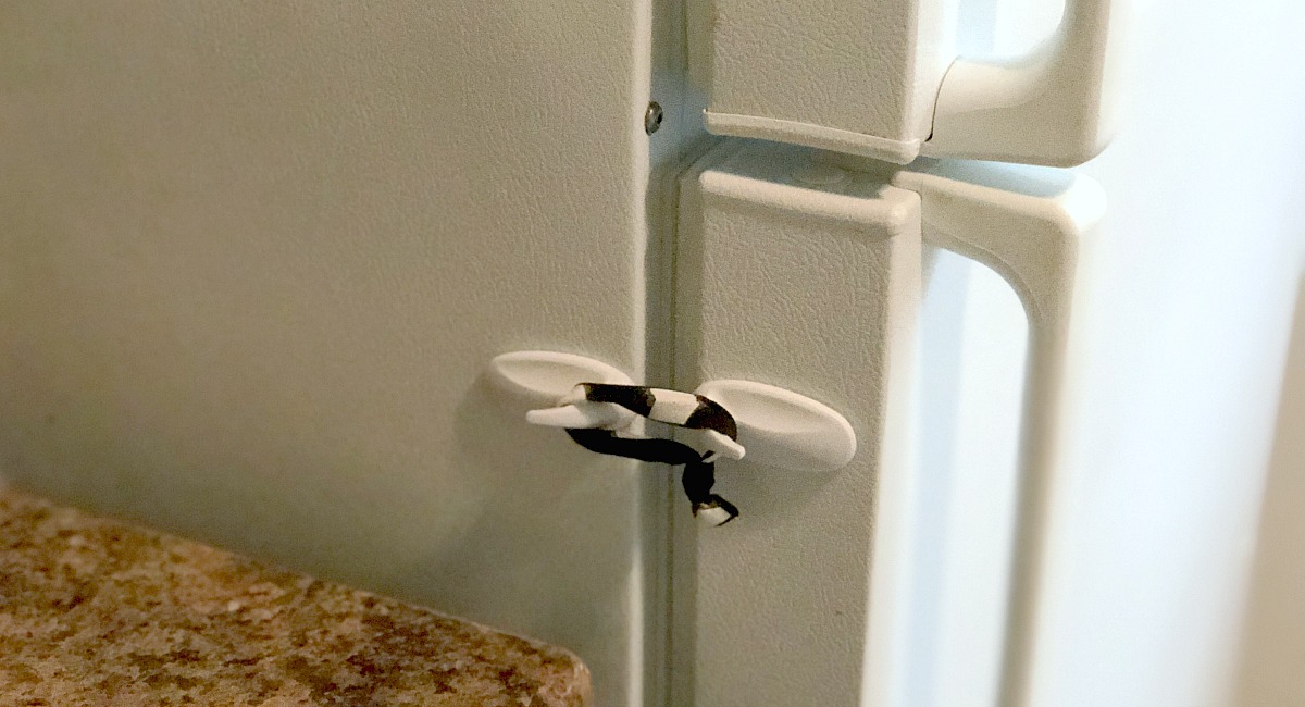 baby-proof your fridge with onlinemand hooks and hair ties