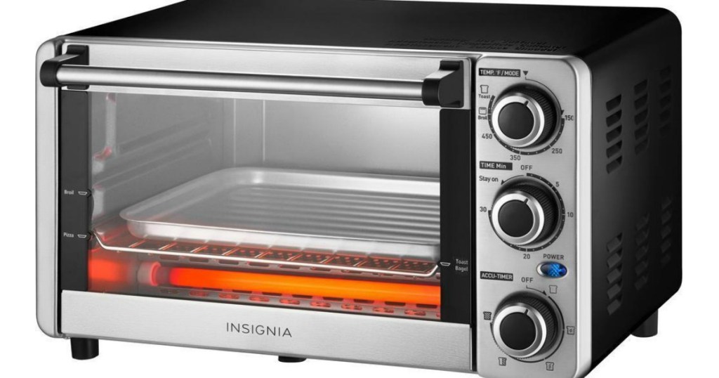 toaster oven cooking with insignia logo on front