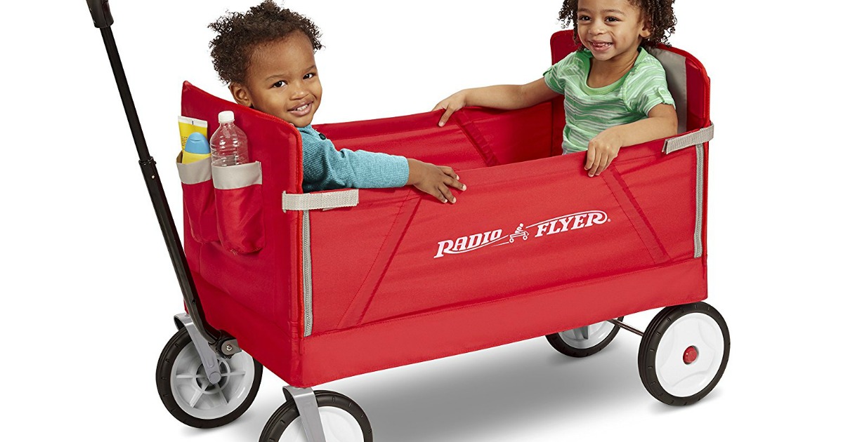 Radio Flyer wagon with two kids sitting inside