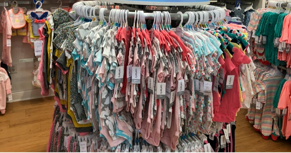 Carter's bodysuits on rack 