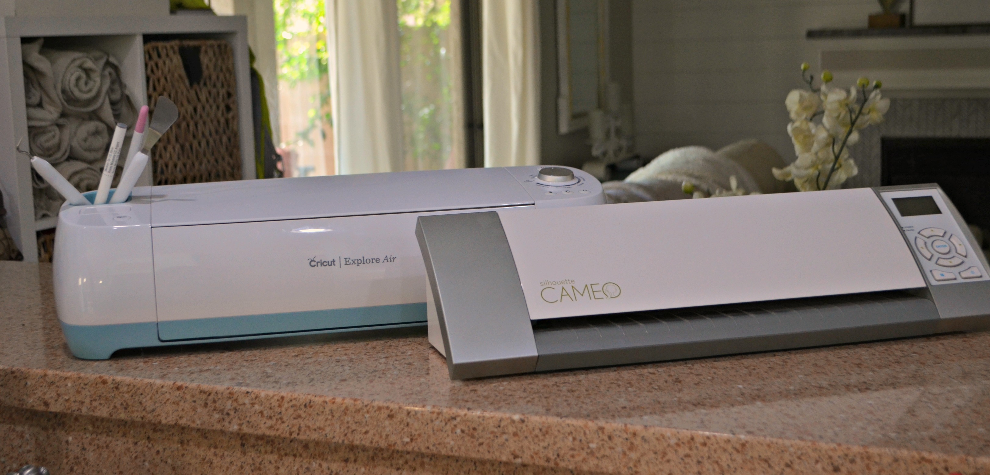 Cricut and Silhouette are both about the size of a large, onlinepact printer.