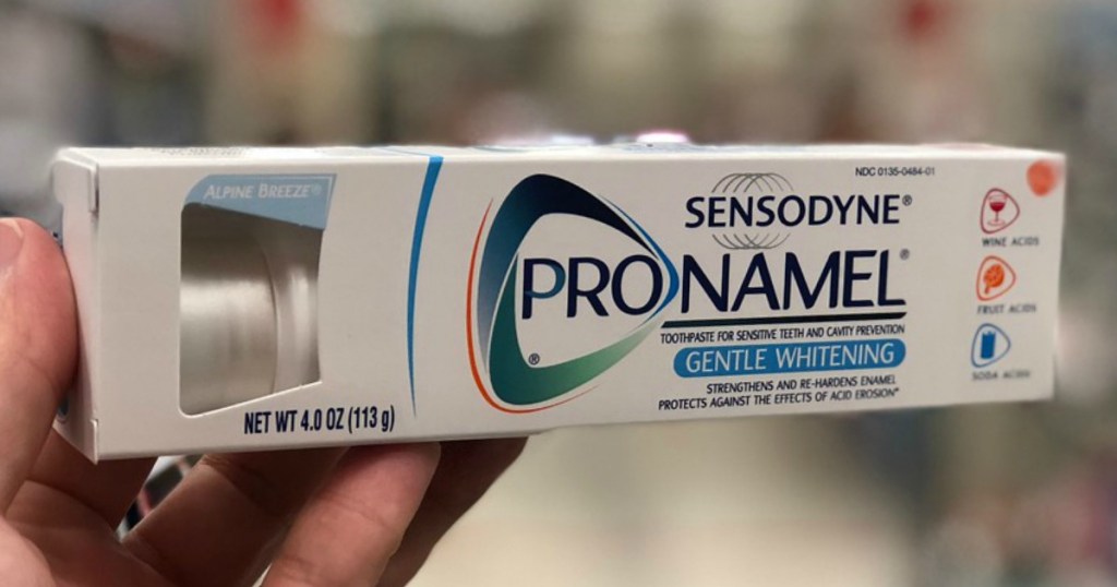 Hand holding Sensodyne Pronamel