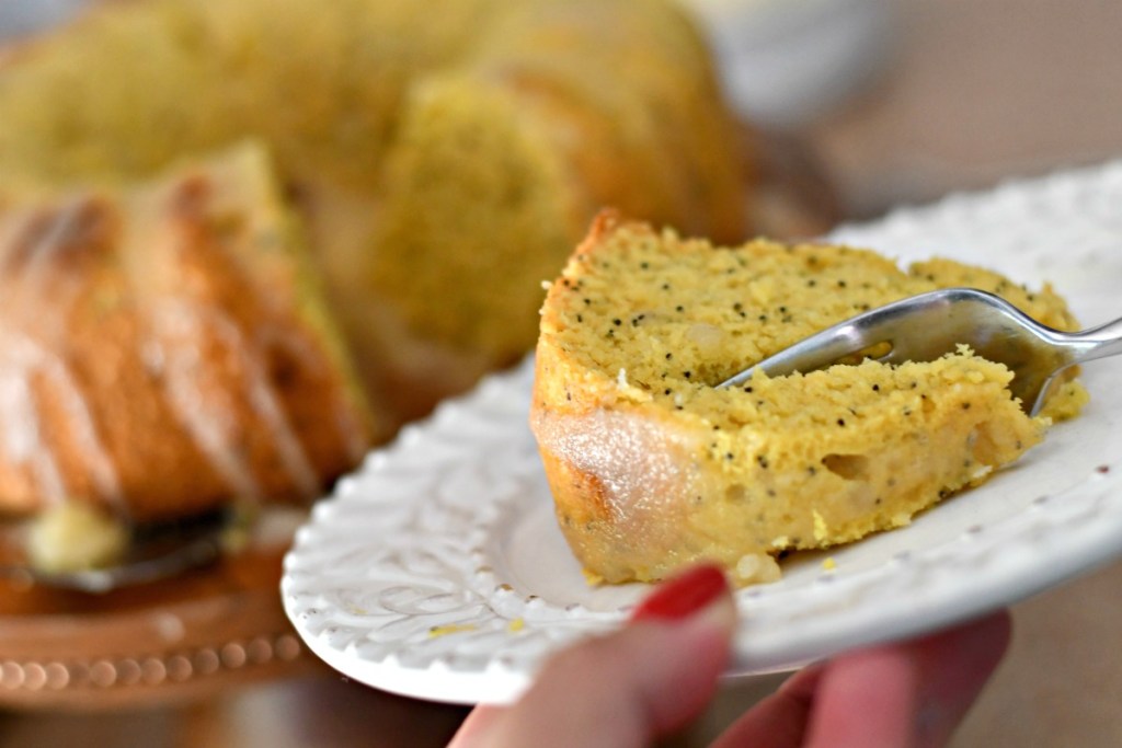 slice of sherry poppy seed cake on the plate