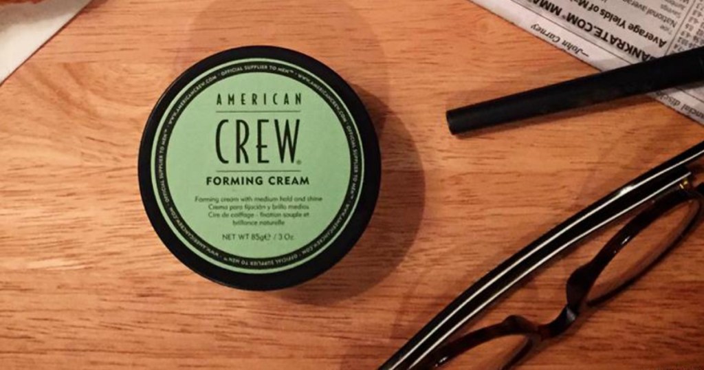 american crew foaming cream with glasses in background