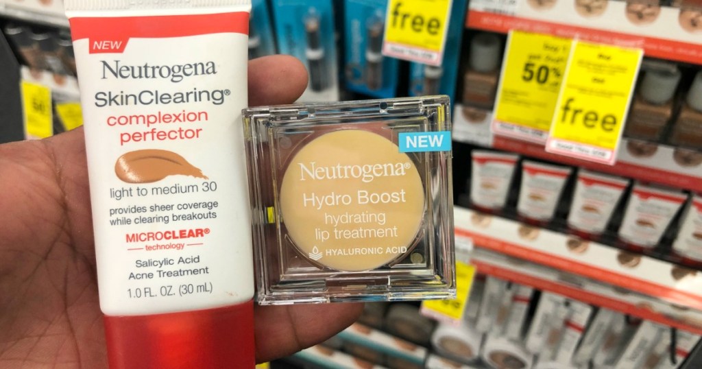 hand holding Neutrogena cosmetics