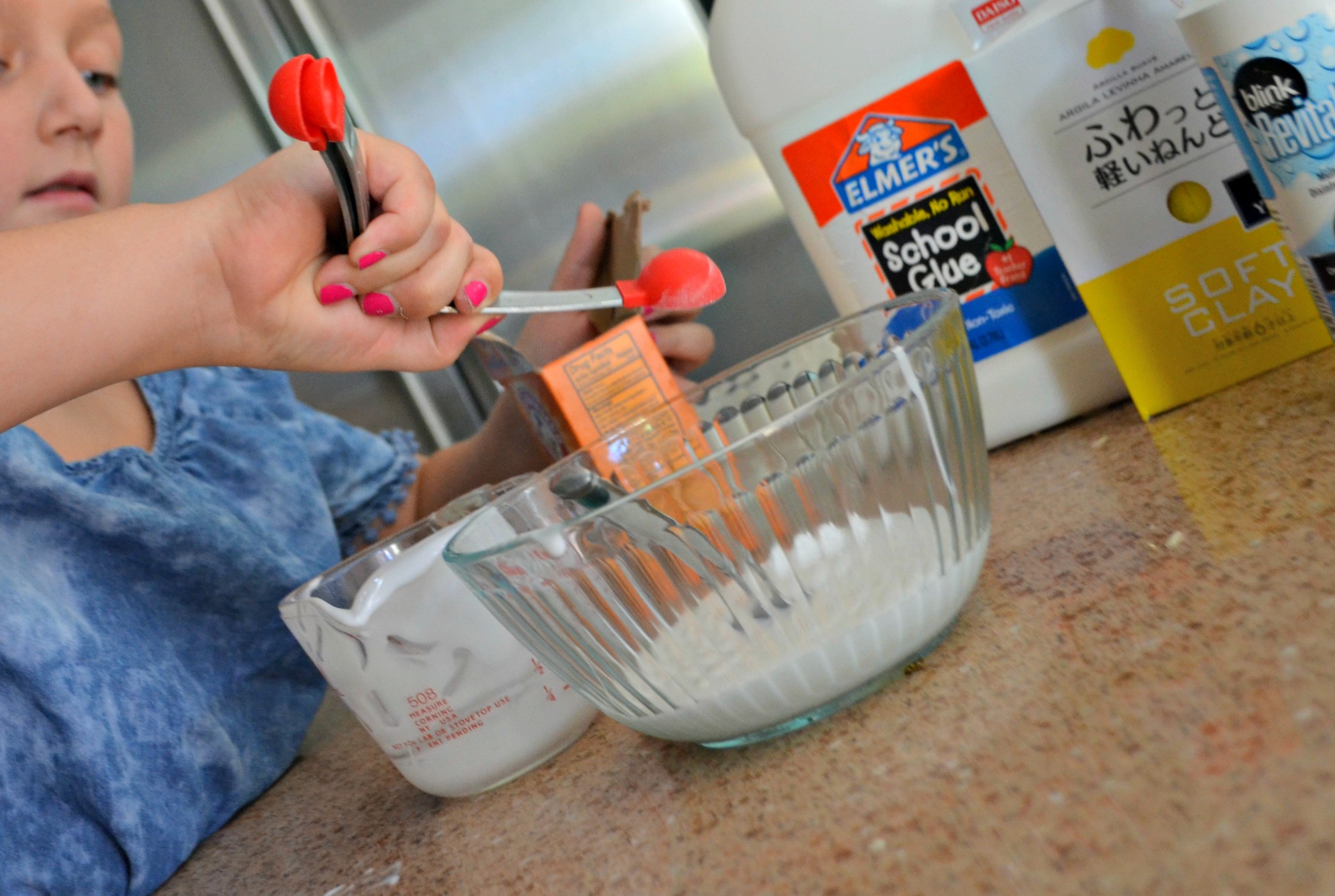 Make diy butter slime using clay – Putting ingredients together