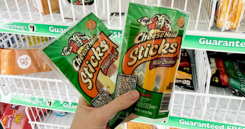 hand holding package of Frigo Cheese Sticks