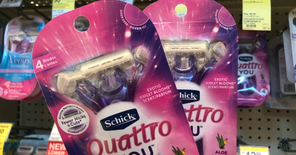 two schick razors in front of shelf