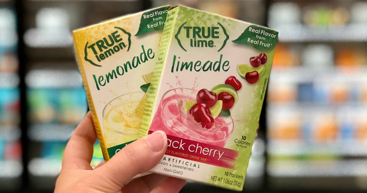 true citrus drink mixes in woman's hand