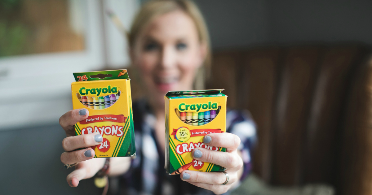 Collin holding crayons as part of back to school deals